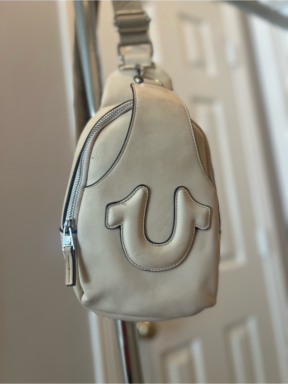 True Religion Cream Leather Crossbody Sling Bag with Signature Horseshoe